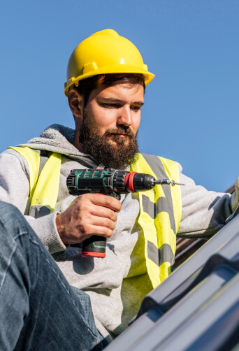 man installing roof